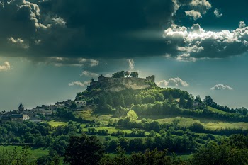 Green Valley Under Gray Sky
