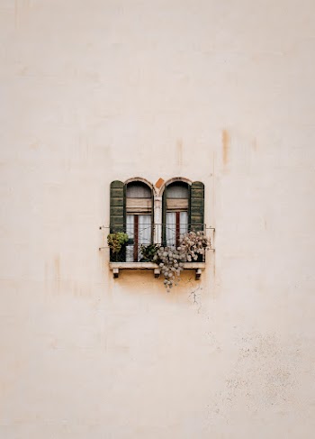 Green Wooden Window on White Concrete Wall · Free Stock Photo