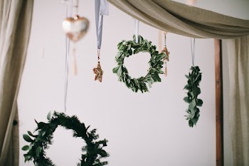 Green Wreath Hanging in Wall