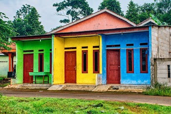 Green, Yellow, and Blue Apartment Building