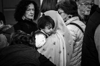Grescale Photography of Woman Carrying Boy