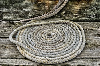 Grey Braided Rope on Wooden Plank