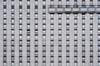 grey concrete building with windows