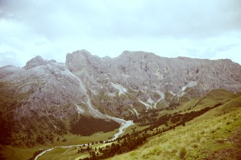 Grey Formation of Rock Mountain by the Green Field during Daytime