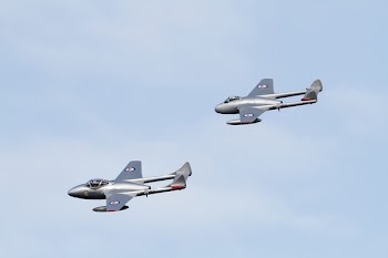 Grey Jet Plane on Air Under Blue Sky during Daytime