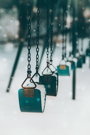 Grey Metal Chain over Snow Field