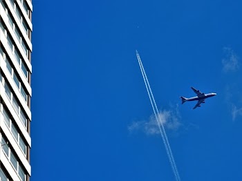 Grey Passenger Plane on Sky at Daytime