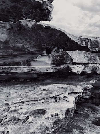 Greyscale Photo of Rock Formations