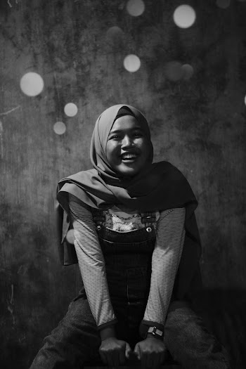 Greyscale Photo of Woman Wearing Hijab