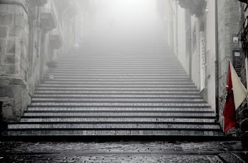 greyscale photography of concrete stairways