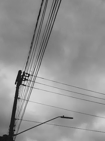 Greyscale Photography of Electric Post