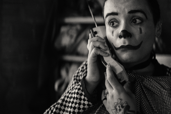 Greyscale Photography of Man Holding Telephone