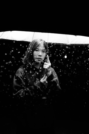 Greyscale Photography of Woman Holding Umbrella