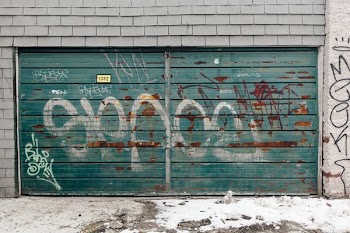 Grimey Green Garage Door