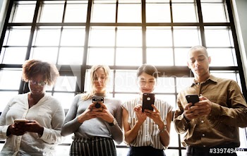Group of diverse people using smartphones