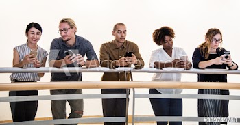 Group of diverse people using smartphones