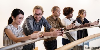 Group of diverse people using smartphones