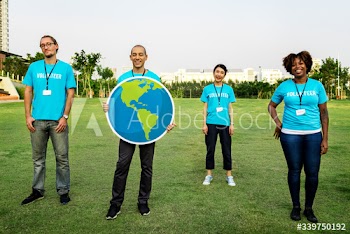 Group of happy and diverse volunteers