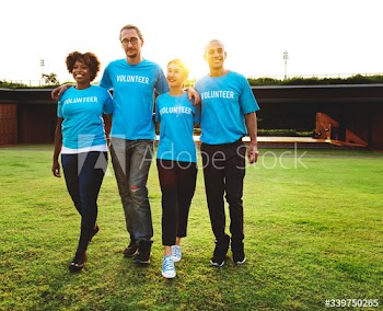 Group of happy and diverse volunteers