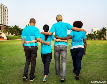 Group of happy and diverse volunteers