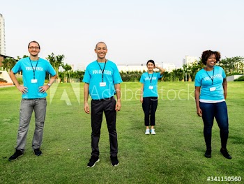 Group of happy and diverse volunteers