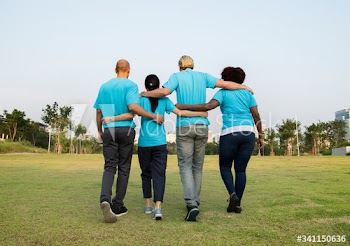Group of happy and diverse volunteers
