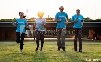 Group of happy and diverse volunteers