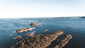 Group of Islands Near at Body of Water