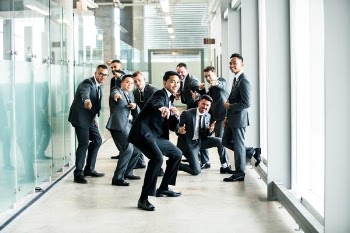 group of man standing in hallway