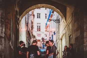 Group of Men on Alley