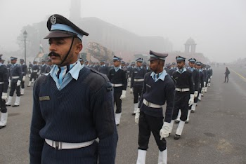 Group of Military Men Wearing Uniform In The Street