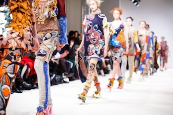group of models walking on fashion show