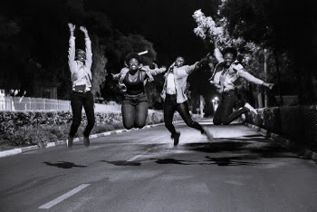 Group Of People Doing A Jump Shot