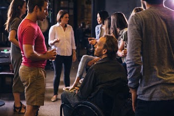 Group of People Drinking and Talking