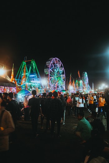 Group of People Gather to Park