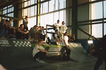 Group of People Gathering on Building