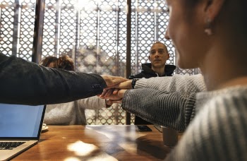 Group of People Joining Hands