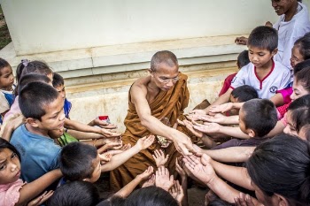 Group of People Lending Their Hands