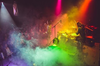 group of people listening on the band