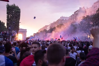 group of people marching on street