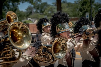 Group of People Playing Musical Instrument Outdoors