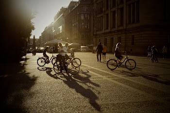 Group of People Riding a Bikes