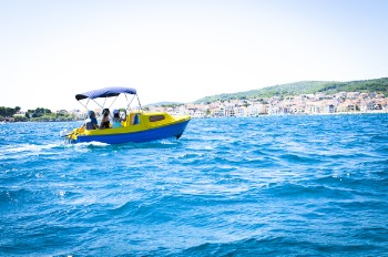 Group of People Riding Bowrider Boat