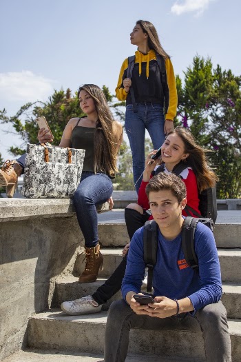 Group of People Sitting on Stairs