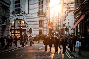 group of people standing at city