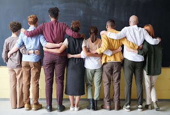 Group of People Standing Indoors · Free Stock Photo
