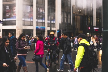 Group of People Walking on Road
