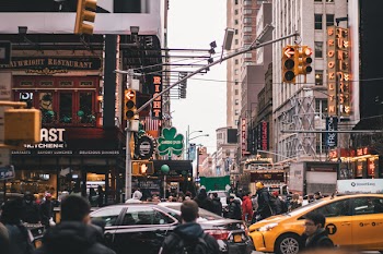 Group of People Walking on Street