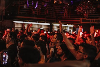 Group Of People Watching A Show
