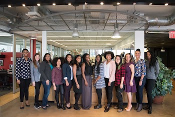 Group of Women Standing Near Desk · Free Stock Photo
